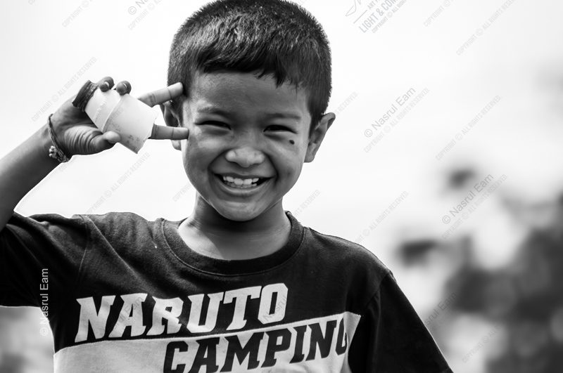 A Boy's Playful Salute - Fine Art Photography Print, Limited Edition Photography, Museum-Quality Print, Black and White Photography,  Art Photography