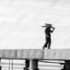 The Solitary Worker on the Pier The Solitary Worker on the Pier - Fine Art Photography Print, Limited Edition Photography, Black and White Photography, Documentary Photography, Art Photography for Sale