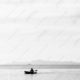 A Lone Boatman, Distant Shore A Lone Boatman, Distant Shore - Fine Art Photography Prints, Limited Edition Photography, Luxury Photography Art, Photography Prints for Collectors, Museum-Quality Photography