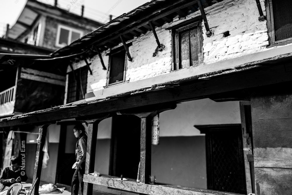 Timeless Gaze Amidst Textured Walls