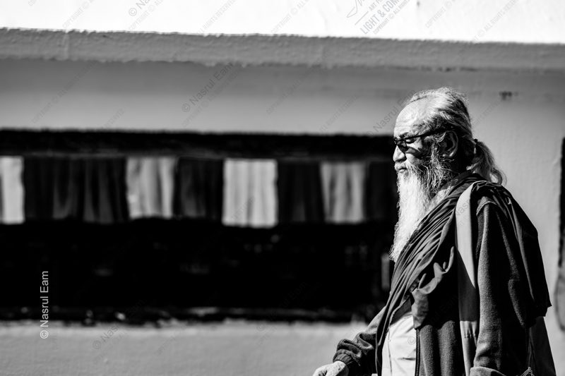 Elder in Profile, Sun on a White Wall Elder in Profile, Sun on a White Wall - Fine Art Photography Print, Limited Edition Photography, Giclée Print, Black and White Portrait, Art Photography for Sale