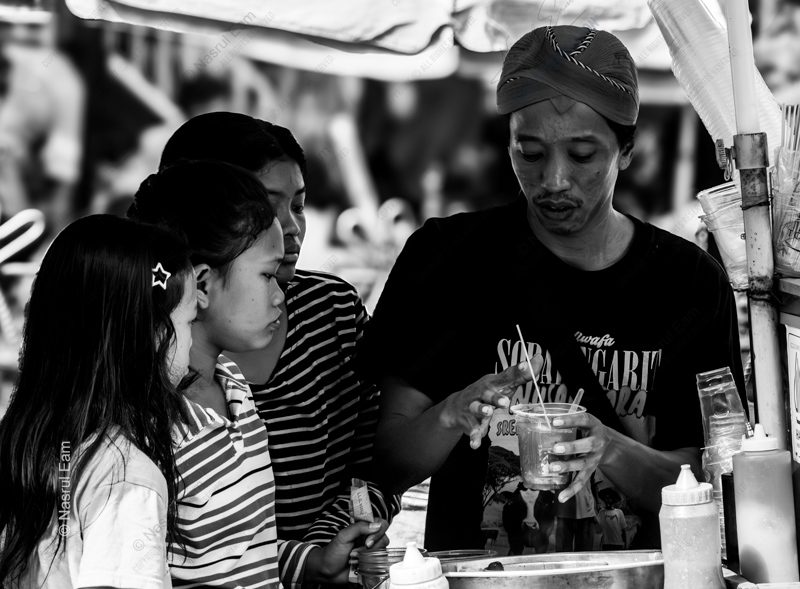 The Drink Vendor and the Waiting Children