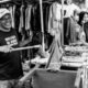 The Laughing Man at the Market Stall The Laughing Man at the Market Stall - Fine Art Photography Print, Limited Edition Photography, Black and White Photography, Documentary Photography, Art Photography for Sale
