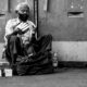 The Tissue Seller by the Wall - Fine Art Photography Print, Limited Edition Photography, Black and White Photography, Documentary Photography, Street Photography
