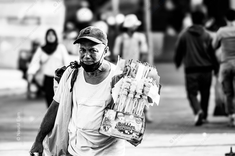 The Bubble Wand Seller The Bubble Wand Seller - Fine Art Photography Print, Limited Edition Photography, Black and White Photography, Street Photography, Art Photography for Sale