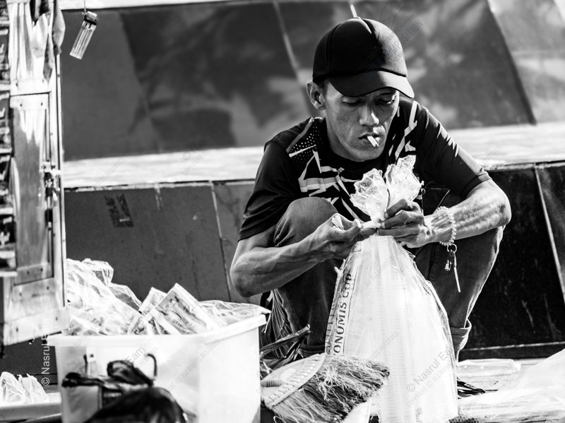 A Vendor's Pause on the Pavement - Fine Art Photography Print, Black and White Photography, Documentary Photography, Street Photography, Limited Edition Print