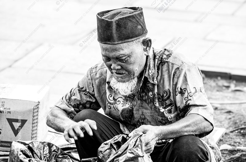 An Elder Sorting His Wares An Elder Sorting His Wares - Fine Art Photography Print, Limited Edition Photography, Museum-Quality Photography, Black and White Photography, Photography Art for Collectors
