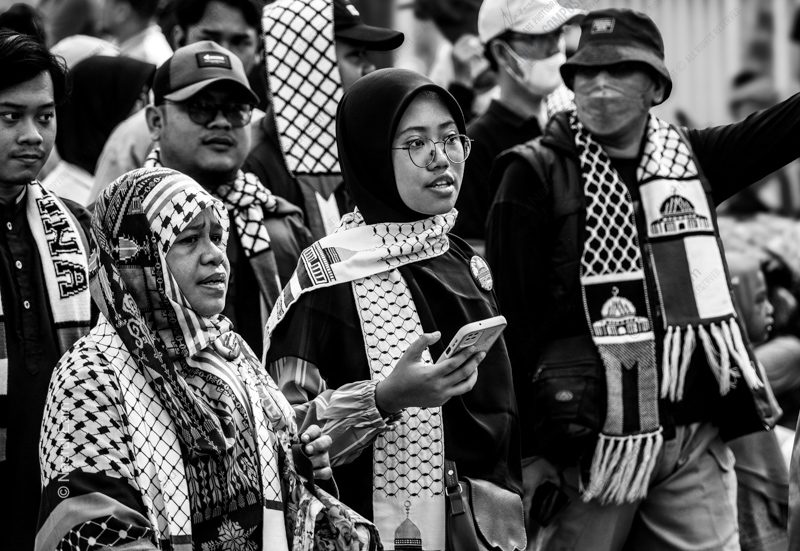 Figures in a Crowd with Keffiyeh Nasrul Eam