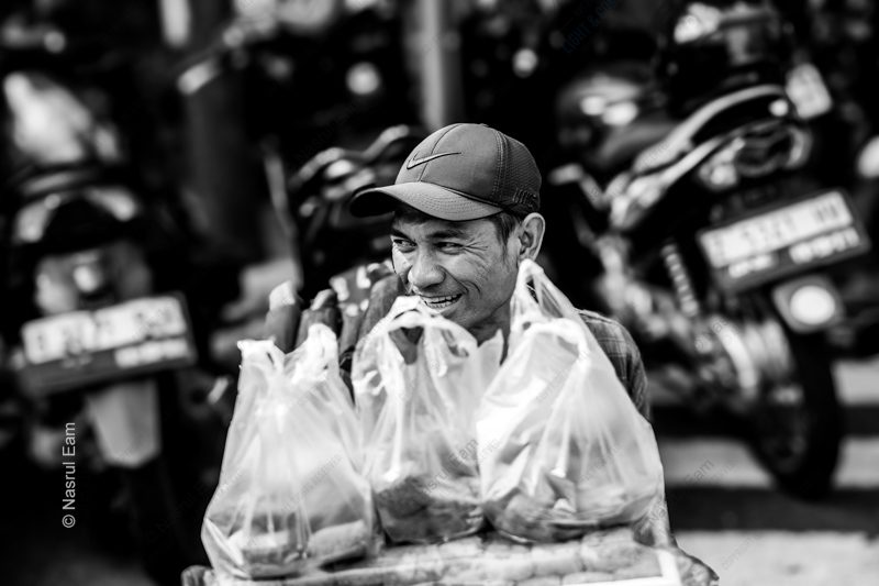 The Bread Seller's Laugh The Bread Seller's Laugh - Fine Art Photography Print, Limited Edition Photography, Museum-Quality Artwork, Luxury Photography Print, Contemporary Art Photography