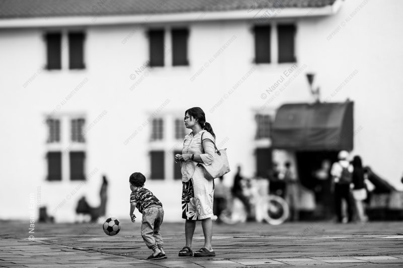 Mother and Son in the Stone Plaza Nasrul Eam