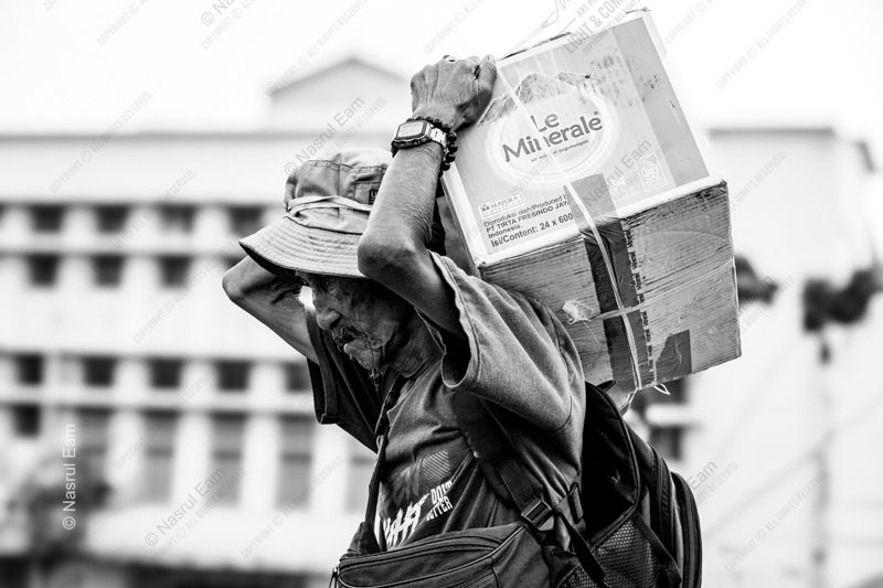 An Elder Carrying His Load An Elder Carrying His Load