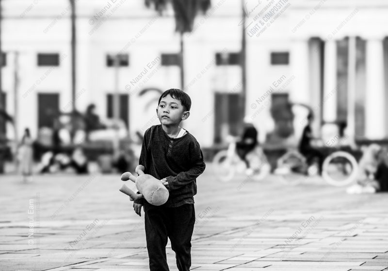 Boy with a Worn Doll Nasrul Eam