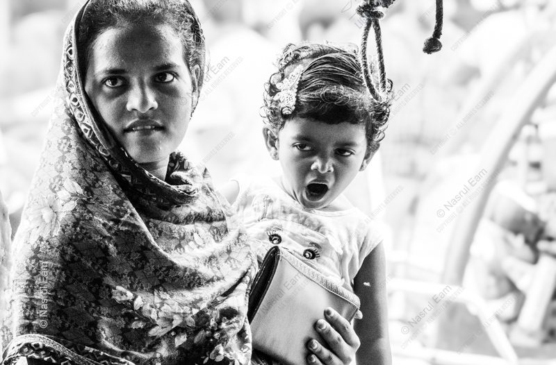 A Woman's Arms, A Child's Yawn