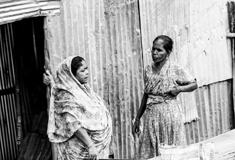 Conversation by the Corrugated Wall - Fine Art Photography Prints, Limited Edition Photography, Black and White Photography, Documentary Photography, Art Photography for Sale