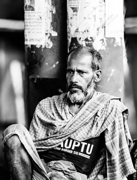 Man Resting by a Poster Wall - Fine Art Photography Print, Limited Edition Photography, Black and White Photography,  Environmental Portraiture, Art Photography Investment