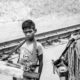 Young Vendor by the Railway Tracks Young Vendor by the Railway Tracks - Fine Art Photography Print, Limited Edition Photography, Black and White Photography, Art Photography for Sale, Collector Photography