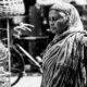 Woman with Bird Cages