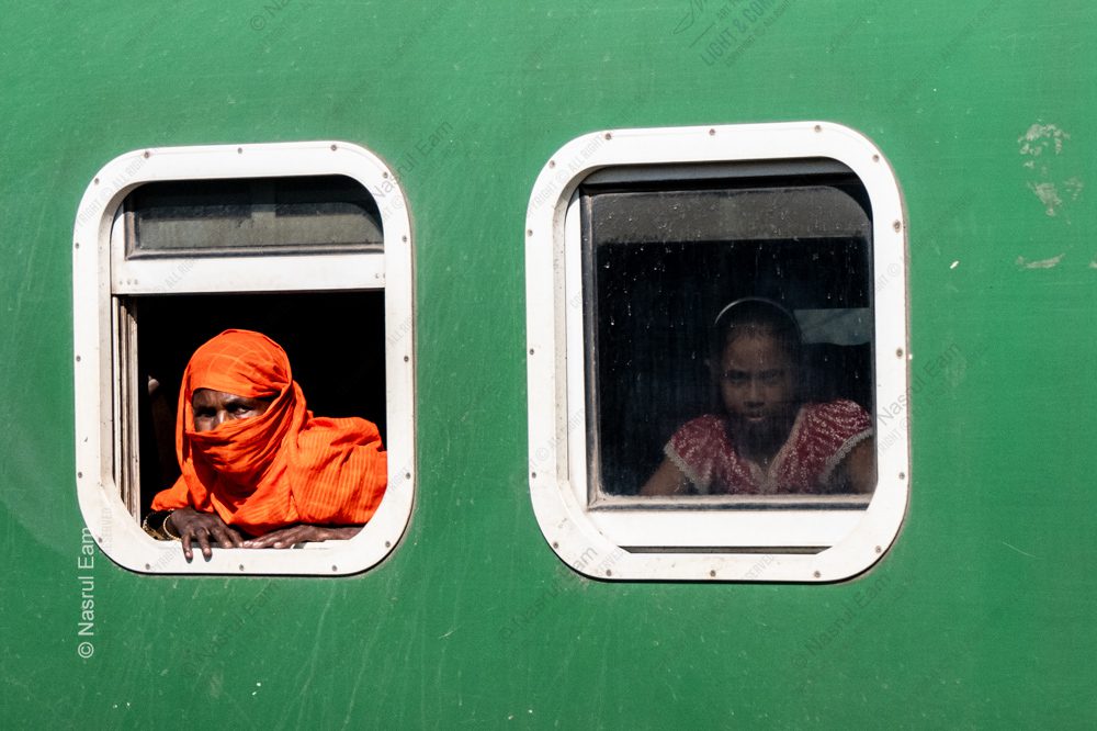 Woman in Orange and Girl in the Window nasrul eam 20251021 Dhaka Rajshahi Tour 20 21 EN1 5297