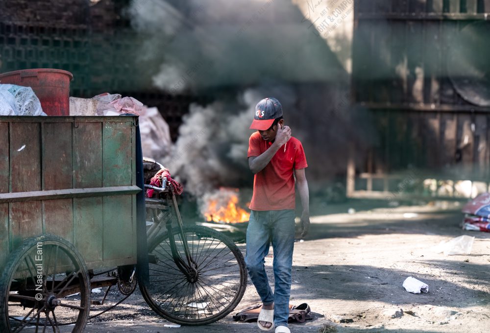 A Young Man's Moment by the Burning Debris