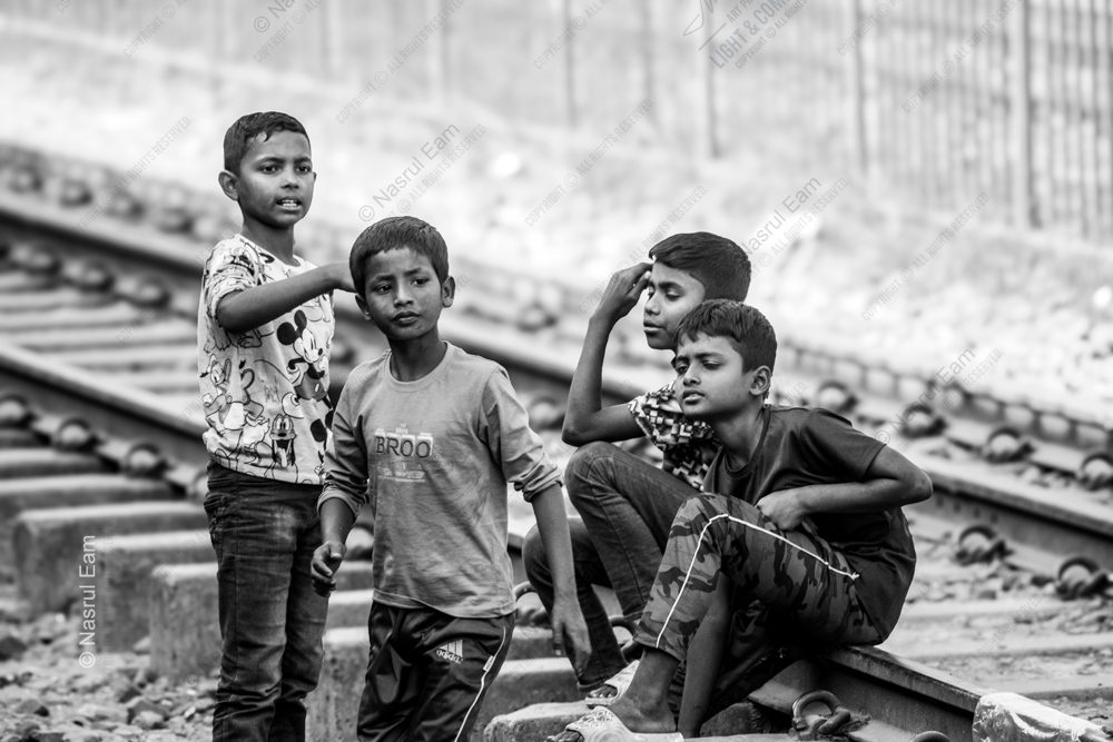 Youthful Pause on the Railway Line