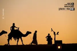 Sunset Camel Ride by Rabih Madi - Sunset Photography, Award Winning Photography, Camel Photography, Photojournalism, Photography Education