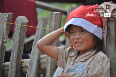 Jumping Rope Girl, by Ryszard Wierzbicki - Candid Photography, Photojournalism, Photography Award,  Award Winning Photo, Laos