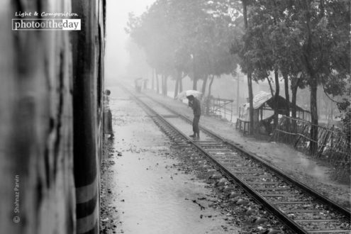 Rainy Good Bye, by Shahnaz Parvin - Photojournalism, Documentary Photography, Black and White Photography, Photo of the Day, Photography Awards