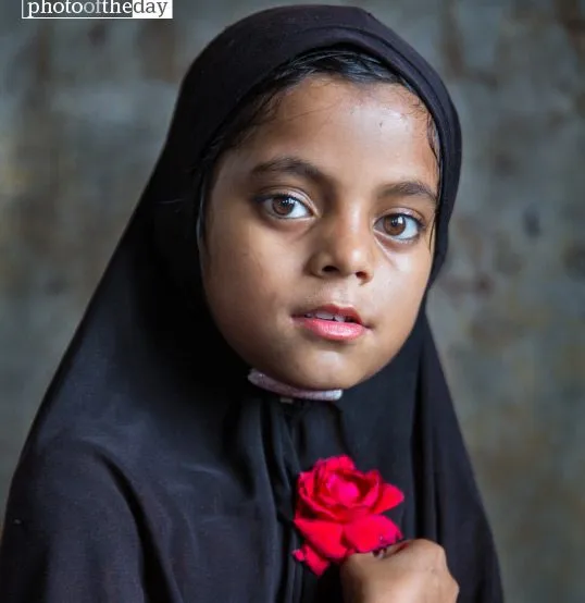 The Girl with a Red Rose, by Shahnaz Parvin - Photojournalism, Portrait Photography, Documentary Photography, Award Winning Photography, Photography Awards