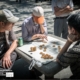 Men Playing Chinese Chess, by Keith Goldstein