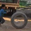 Running Tyre, by Ryszard Wierzbicki - Street Photography, Photojournalism, Photography Award, Award Winning Photo, Ryszard Wierzbicki