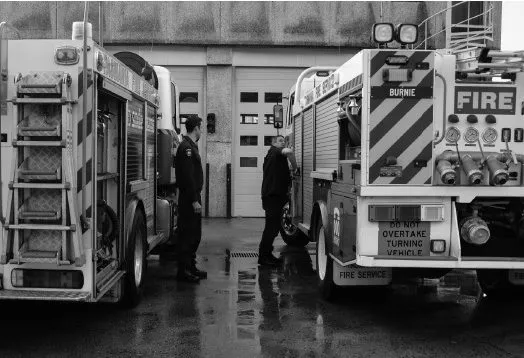 Firefighters Checking Truck by Blair Horgan