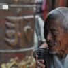 A Pilgrim at Boudhanath, by Ryszard Wierzbicki - Photojournalism, Candid Photography, Photography Awards, Photo of the Day, Ryszard Wierzbicki
