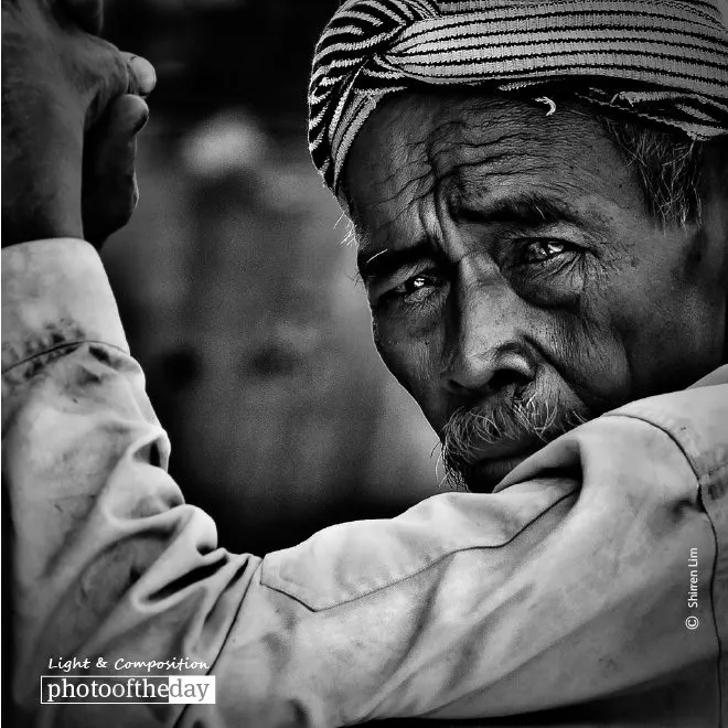 A Traditional Canoe Boatman by Shirren Lim