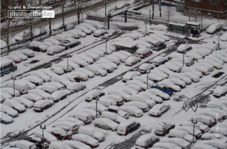 Snow Covered Cars by Des Brownlie