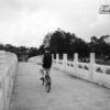 A Cyclist on the White Bridge, by Siew Bee Lim - Street Photography, Photography Award, Photo of the Day, Composition, Siew Bee Lim