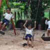 Boys on the Swings, by Ryszard Wierzbicki - Photojournalism, Travel Photography, Award-Winning Photography, Ryszard Wierzbicki, Photo of the Day