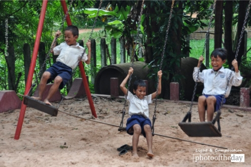 Boys on the Swings, by Ryszard Wierzbicki - Photojournalism, Travel Photography, Award-Winning Photography, Ryszard Wierzbicki, Photo of the Day