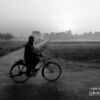 A Cyclist, by Jabbar Jamil - Street Photography, Photo of the Day, Black and White Photography, Award Winning Photography, Jabbar Jamil