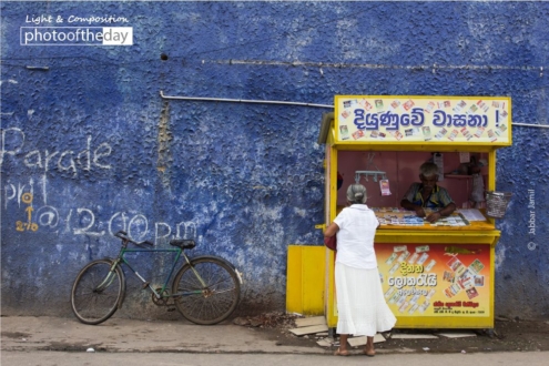 A Lottery Stall, by Jabbar Jamil - Street Photography, Color Photography, Photo of the Day, Photography Awards, Jabbar Jamil