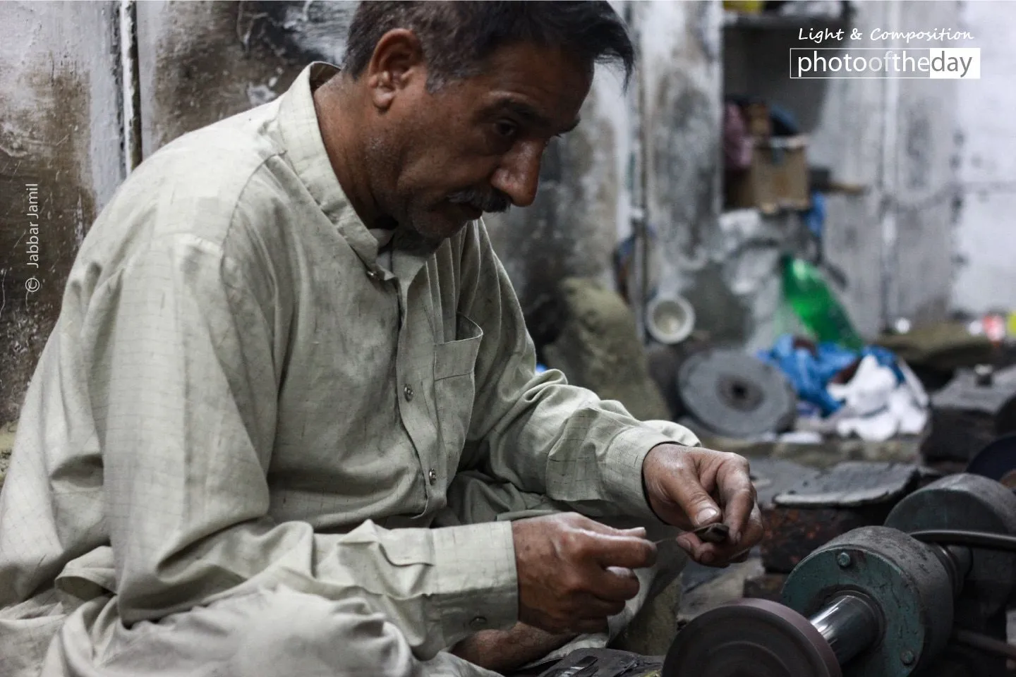A Worker at Surgical Factory, by Jabbar Jamil - Documentary Photography, Photojournalism, Street Photography, Photography Awards, Jabbar Jamil