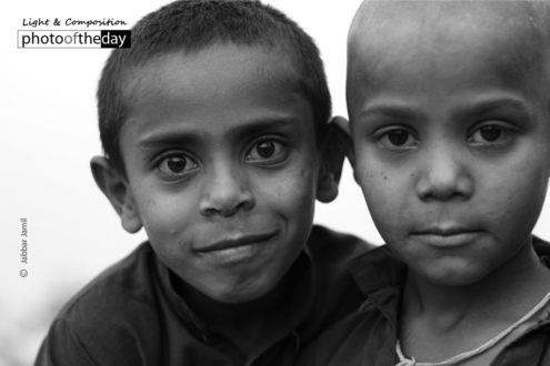 Tiny Frame, by Jabbar Jamil - Photojournalism, Street Photography, Portrait Photography, Photography Awards, Light & Composition University