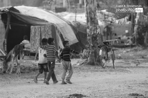 When They Were Leaving, by Jabbar Jamil - Street Photography, Photojournalism, Black and White Photography, Photography Awards, Photo of the Day