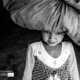 The Girl with a Bundle by Lavi Dhurve