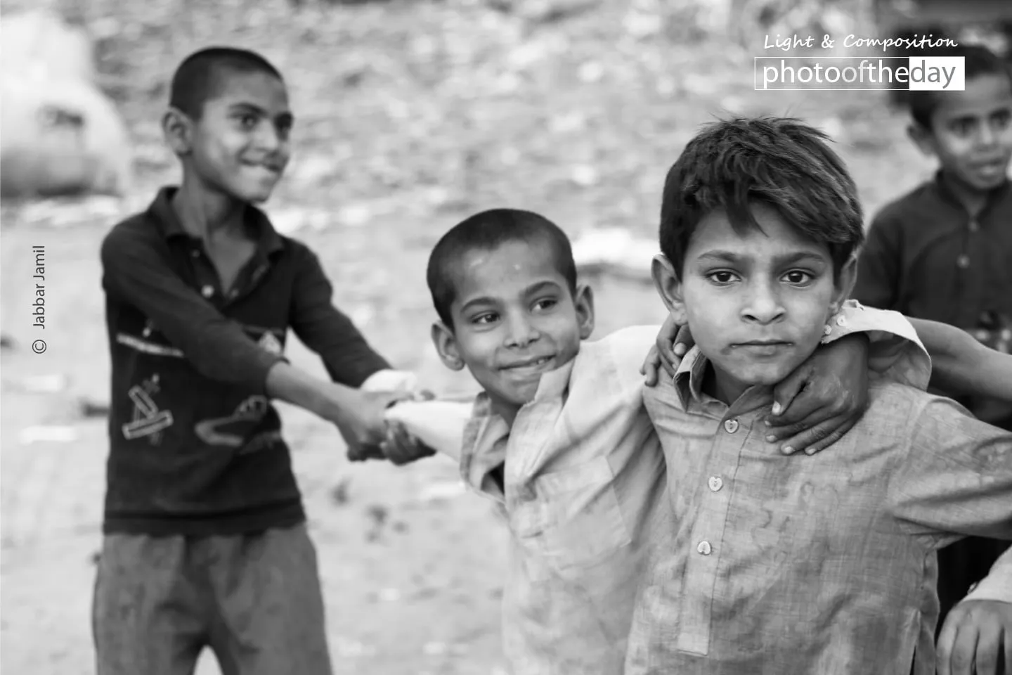 Happy Kids of Slums by Jabbar Jamil - Photojournalism, Street Photography, Award-Winning Photography, Photography Awards, Light & Composition University