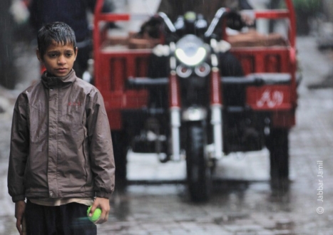 Rainy Cricket by Jabbar Jamil - Street Photography, Award Winning Photography, Photojournalism, Photography Awards, Light & Composition University