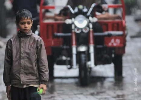 Rainy Cricket by Jabbar Jamil - Street Photography, Award Winning Photography, Photojournalism, Photography Awards, Light & Composition University