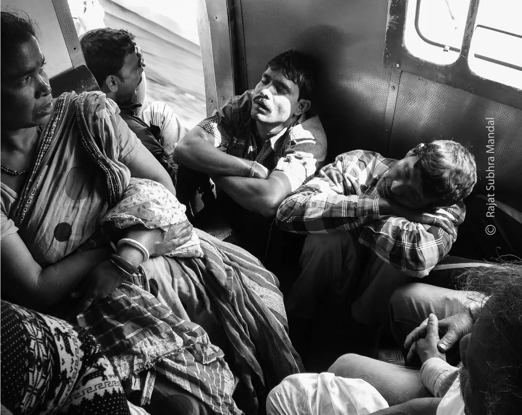 Inside a Local Train by Rajat Subhra Mandal - Documentary Photography, Photojournalism, Photography Awards, Photo of the Day, Rajat Subhra Mandal