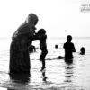 Beach Sunset with Granny by Andisiwe Boya - Photojournalism, Black and White Photography, Award Winning Photography, Photography Awards, Andisiwe Boya