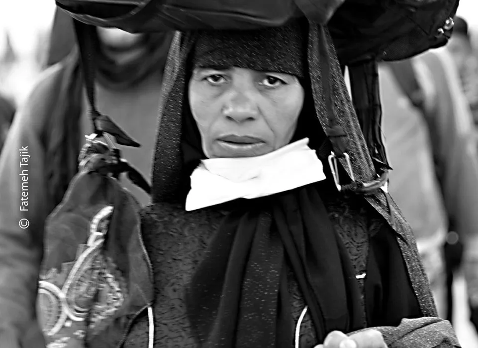 A Woman at the Arbaeen Ceremony by Fatemeh Tajik - Photojournalism, Arbaeen,  Photography Awards, Fatemeh Tajik, Street Photography