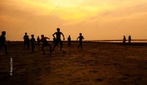 Beach Football at Dusk